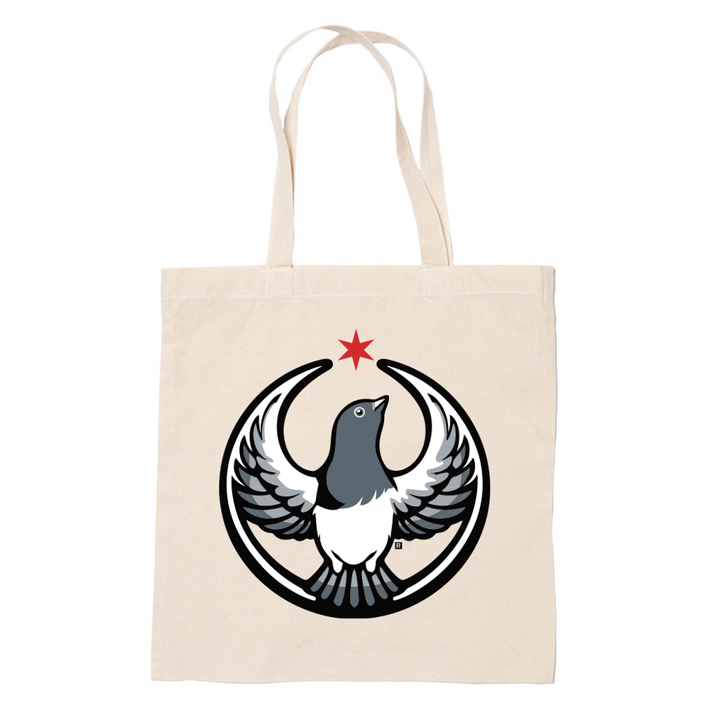A canvas tote bag with the Rebel Pigeon Alliance Logo. It uses a pigeon with outstretched wings to mimic the shape of the Star Wars Rebel Alliance Logo. The bird is printed in black, white, and grey with a red star above its head.