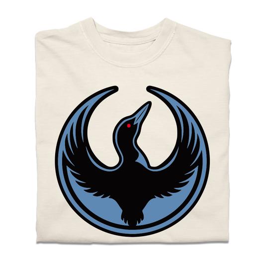 A folded heavyweight cream shirt with the Rebel Loon Alliance Logo. It uses a loon with outstretched wings to mimic the shape of the Star Wars Rebel Alliance Logo. The loon is printed blue & black with red eye.