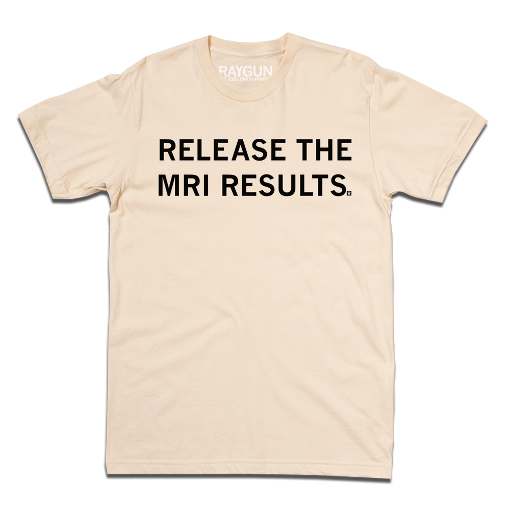 Beige tee with black text that says, "Release the MRI Results"