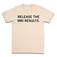 Beige tee with black text that says, "Release the MRI Results"