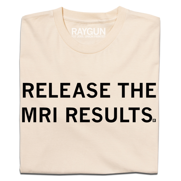 A folded cream t-shirt with blank ink text that reads 