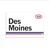 Retro style rectangular magnet. White base with a red oval in the top right surrounding "515" in blue print. Black text to the left says, "Des Moines" with blue and red lines below that.
