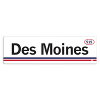 Retro style rectangular sticker. White base with a red oval in the top right surrounding "515" in blue print. Black text to the left says, "Des Moines" with blue and red lines below that.