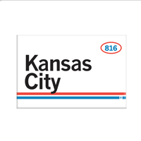 Retro style rectangular magnet. White base with a orange oval in the top right surrounding "816" in blue print. Black text to the left says, "Kansas City" with orange and blue lines below that.