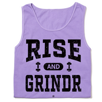 A folded heavyweight violet tank top with black ink styled like a gym shirt with faded text that reads "Rise and Grindr."