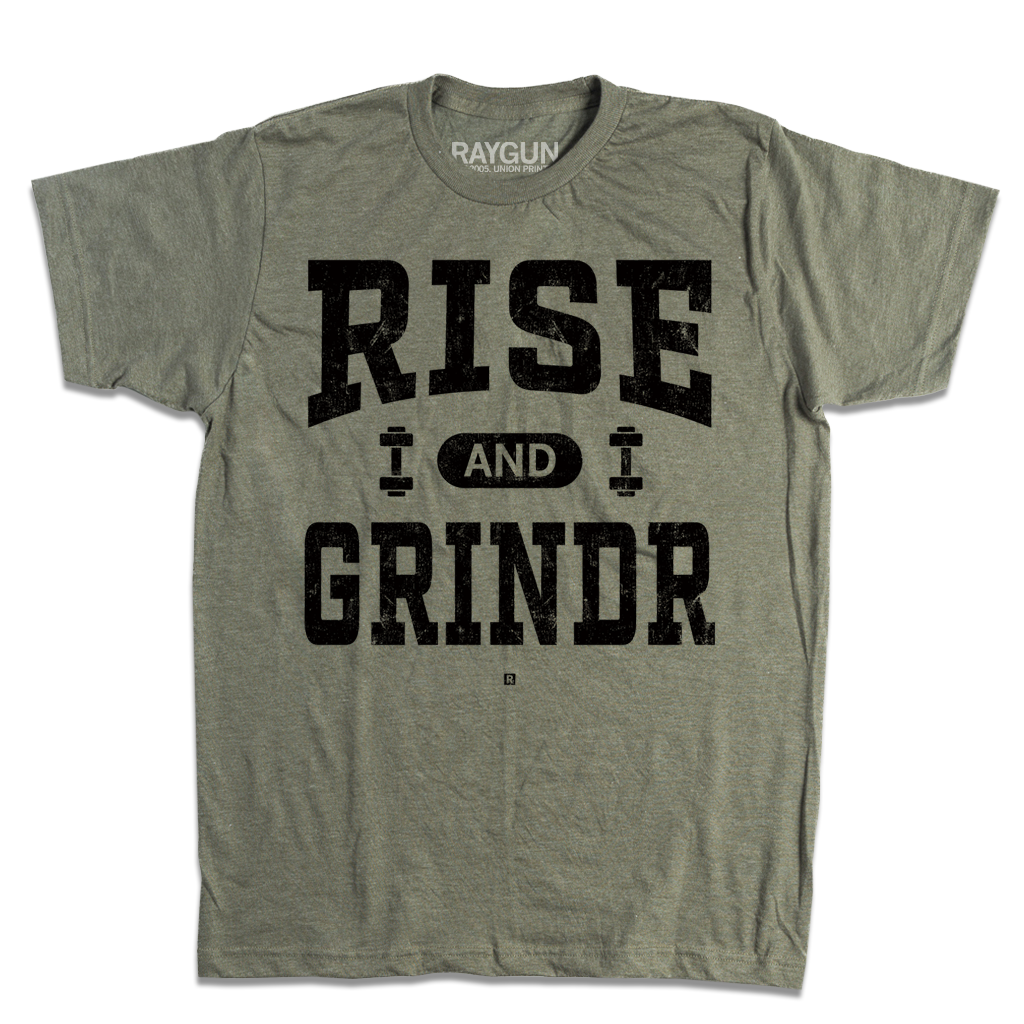 A heather military green t-shirt with black ink styled like a gym shirt with faded text that reads "Rise and Grindr" with dumbbells on either side of "and."