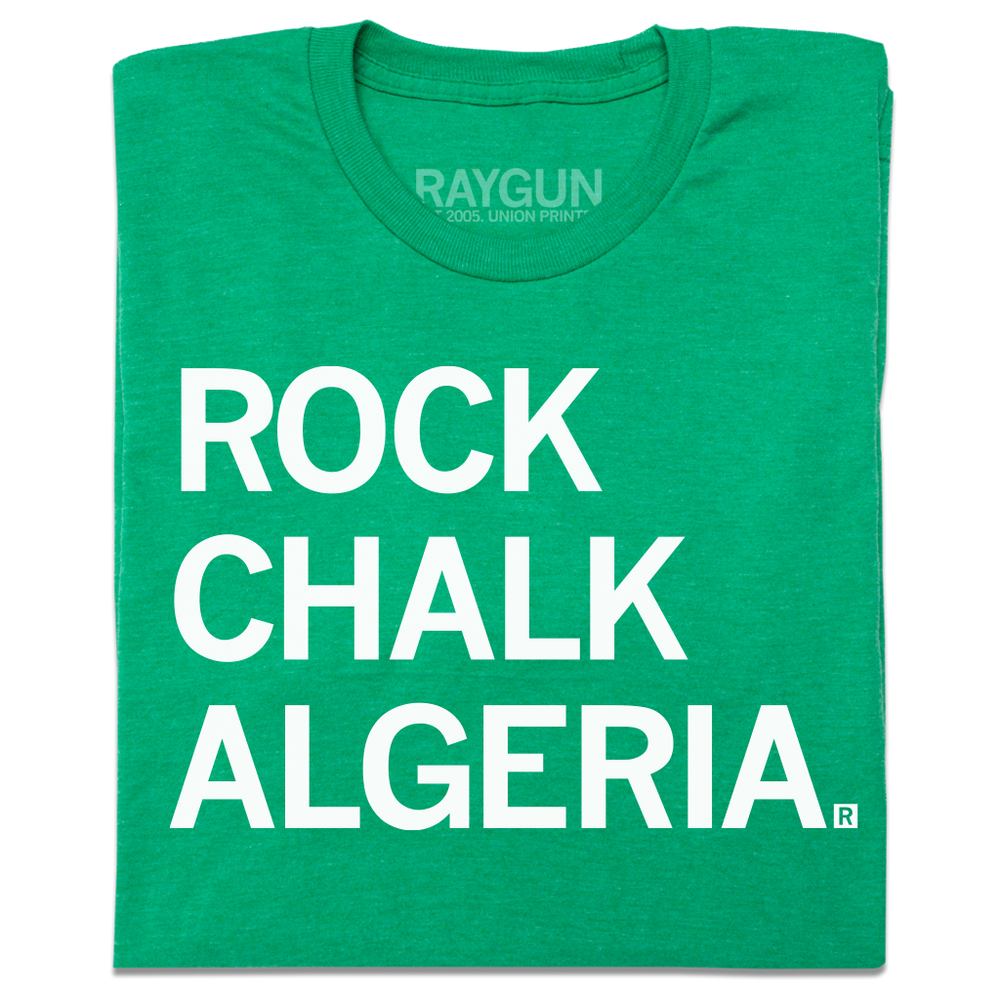A folded heather green t-shirt with left-aligned white ink that reads "Rock Chalk Algeria"