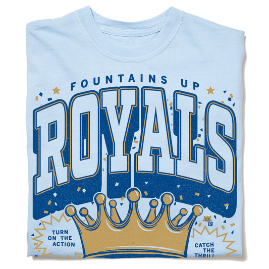 Light blue union made heavyweight t-shirt featuring a large gold crown and the graphic Fountains Up Royals, with the text Turn on the action and Catch the thrill.