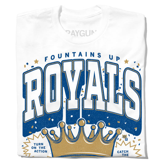 White Kansas City Royals t-shirt featuring the text FOUNTAINS UP above a large team logo and a gold crown, with smaller text reading TURN ON THE ACTION and CATCH THE.