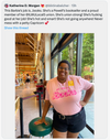 A smiling person wearing a sweatshop-free, pink t-shirt that says MY JOB IS... Books stands inside a bookstore.
