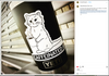 A black Yeti tumbler featuring a Caffeinated AF vinyl sticker of a cartoon cat holding a steaming mug of coffee.