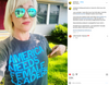 A blonde person in mirrored aviator sunglasses points to a union-made t-shirt that reads AMERICA NEEDS FEMALE LEADERS in large blue letters.