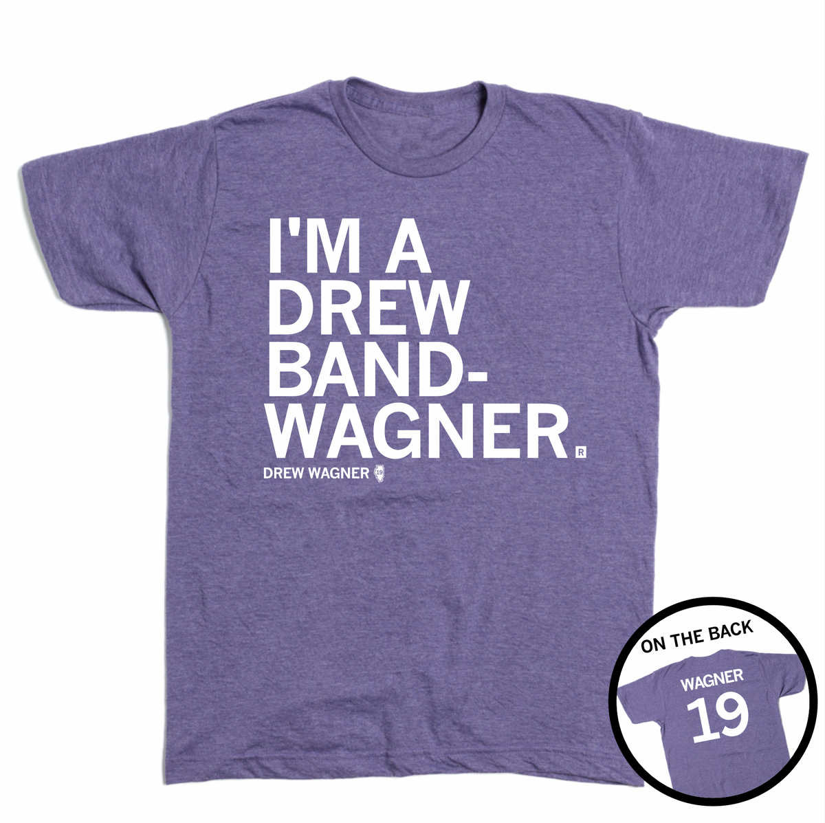 Short-sleeve heather purple t-shirt with left-aligned white text that reads "I'M A DREW BAND-WANGER" above smaller text that says, "DREW WAGNER" with a small outline of Illinois that has 19 in its center. A circle image in the bottom right corner shows the back of the t-shirt printed like a jersey with "WAGNER" above 19.