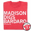 A folded heather red t-shirt with left-aligned white text that reads "Madison digs Bardaro" with smaller print below that says, "Anna Bardaro" with a small outline of Wisconsin to the right that has 2 in its center. In the bottom right corner a circular image is overlayed that shows the back of the shirt printed like a sports jersey.