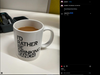 A white 11 oz mug filled with a brown beverage, featuring the text ID RATHER BE DRINKING RANCH.
