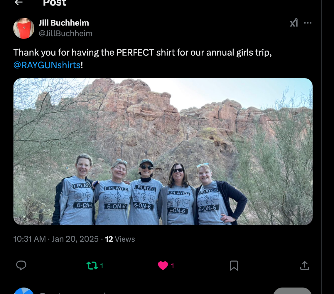Five women stand in front of rock formations, each wearing a heather grey RAYGUN t-shirt that says I PLAYED 6-ON-6.