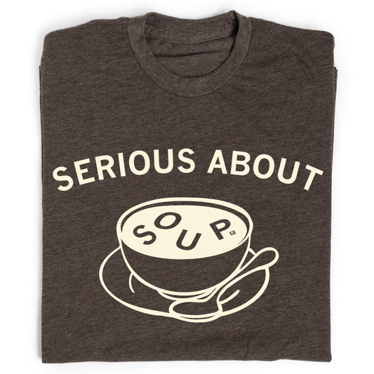 Dark gray heather brown t-shirt featuring the text SERIOUS ABOUT above a bowl of soup with SOUP written inside it.