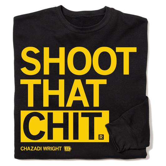 A folded black crewneck sweatshirt with left aligned gold ink print that reads "Shoot that chit" in large text over smaller font that says, "Chazadi Wright 11". The back has gold print laid out like a jersey that says, "Wright 11"