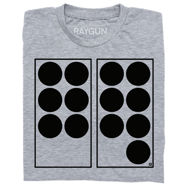Folded heather grey t-shirt with black ink depicting two vertical rectangles side-by-side. The one on the left has six black dots in it while the one on the right has seven. Referencing 67.