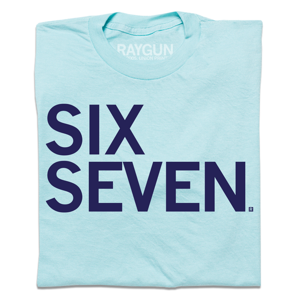 Light blue t-shirt with navy left-aligned text that says, 