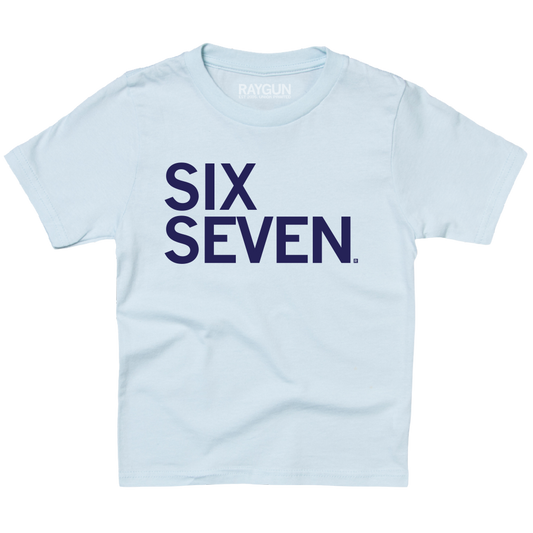 Light blue youth t-shirt with navy left aligned text that reads "Six Seven"