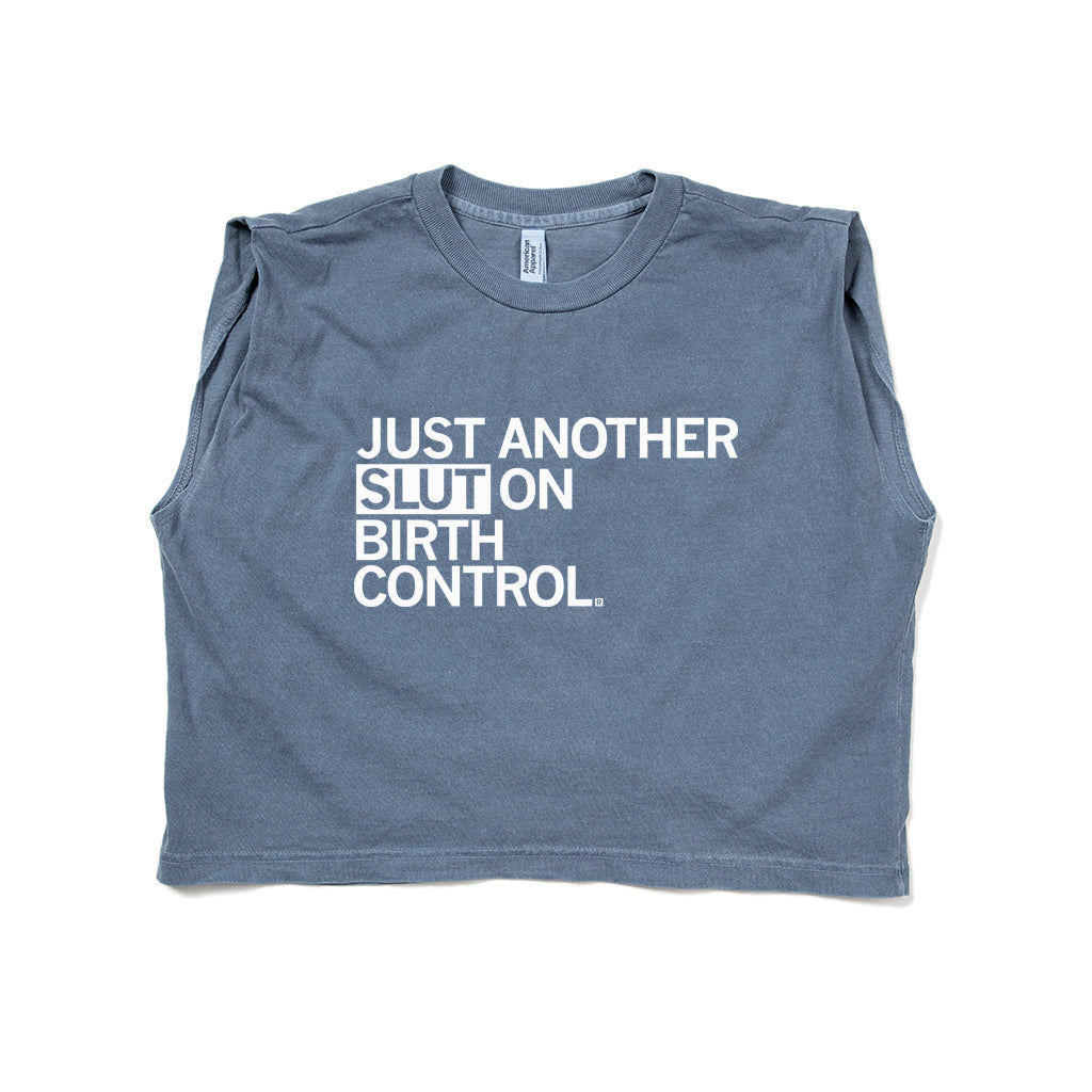 Blue heavyweight cotton muscle crop top with the white text JUST ANOTHER SLUT ON BIRTH CONTROL.