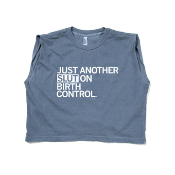 Blue heavyweight cotton muscle crop top with the white text JUST ANOTHER SLUT ON BIRTH CONTROL.