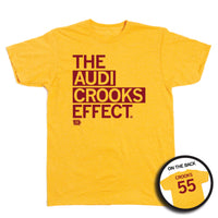 A heather mellow yellow t-shirt with left-aligned cardinal print text that says, "The Audi Crooks Effect" on the front. The back is laid out like a sports jersey and reads "Crooks 55"