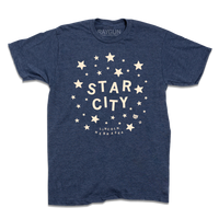 Heather denim t-shirt with glow in the dark ink that reads "Star City. Lincoln, Nebraska" surrounded by stars.