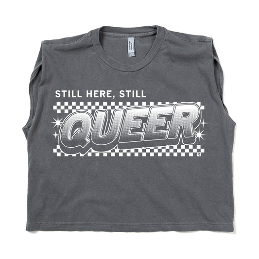Dark grey, union-made muscle tank top with the text STILL HERE, STILL QUEER screen printed over a white checkered background.