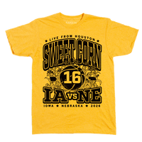 Heather  gold t-shirt with black ink text that reads "Live from Houston: The Sweet Corn 16. IA vs NE. Iowa, Nebraska 2026." In the center of the shirt is a basketball with the number 16 on it, Iowa to the left, Nebraska to the right, and corn growing behind it.