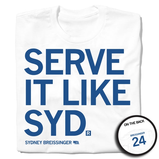 Officially licensed white T-shirt featuring blue text that reads SERVE IT LIKE SYD. and SYDNEY BREISSINGER 24, with a circular inset showing the back of the shirt reading BREISSINGER 24.