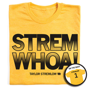 Heather mellow yellow union-made t-shirt with STREM WHOA! in large black lettering and TAYLOR STREMLOW 1 printed below, with an inset image showing the back of the shirt reading STREMLOW 1.