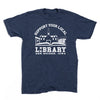 Dark blue RAYGUN t-shirt featuring a white graphic of an open book and a building silhouette with the text: Support Your Local Library Des Moines, Iowa.