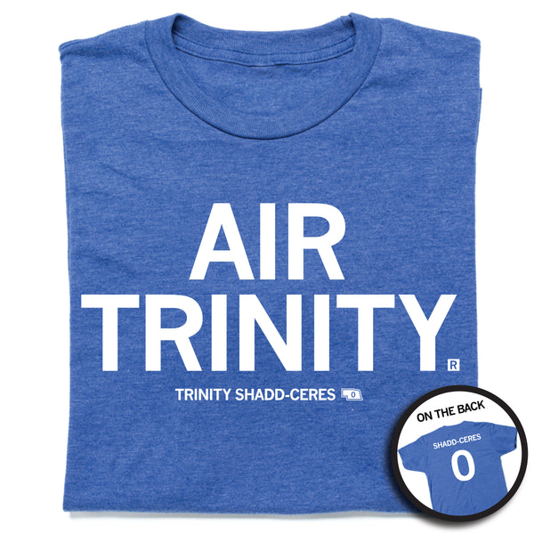 A folded heather royal blue t-shirt with all caps white text that says, 