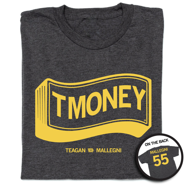 A folded charcoal t-shirt with gold ink. There's an illustration of a stack of money in the center with 
