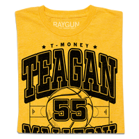 A heather gold tee with blank ink print that says, "T-Money" in small font at the top. Below that is "Teagen Mallegni" with an illustration of a basketball court in the center and a large basketball with the number 55 in the middle of the court.