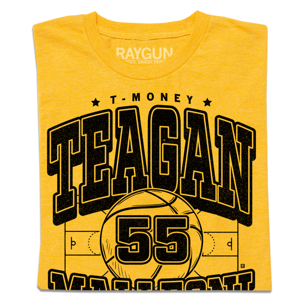 A heather gold tee with blank ink print that says, 