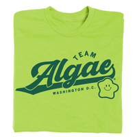 A folded lime green shirt with forest green ink that says, "Team Algae. Washington, D.C." with a smiling algae mascot.