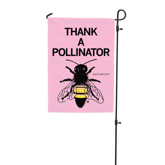 Pink polyester garden flag on a metal stand that reads THANK A POLLINATOR above an illustration of a bee with the text youre welcome! next to it.