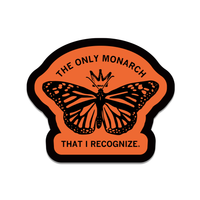 An orange die-cut sticker with a black boarder and black images that reads "The Only Monarch" in curved text above a monarch butterfly with a crown and more text below that states "That I recognize"