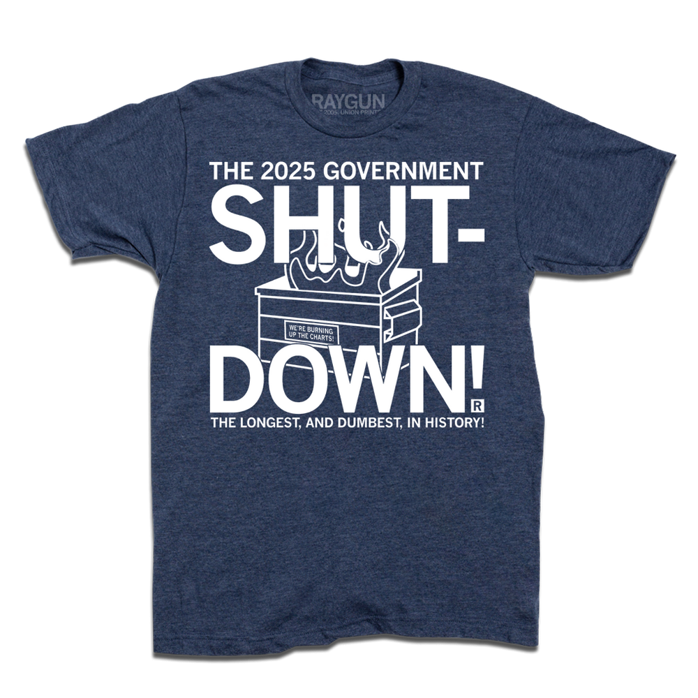 A Heather navy shirt with text in white ink that reads "The 2025 Government Shutdown: the longest and dumbest in history." over an illustration of a dumpster on fire.
