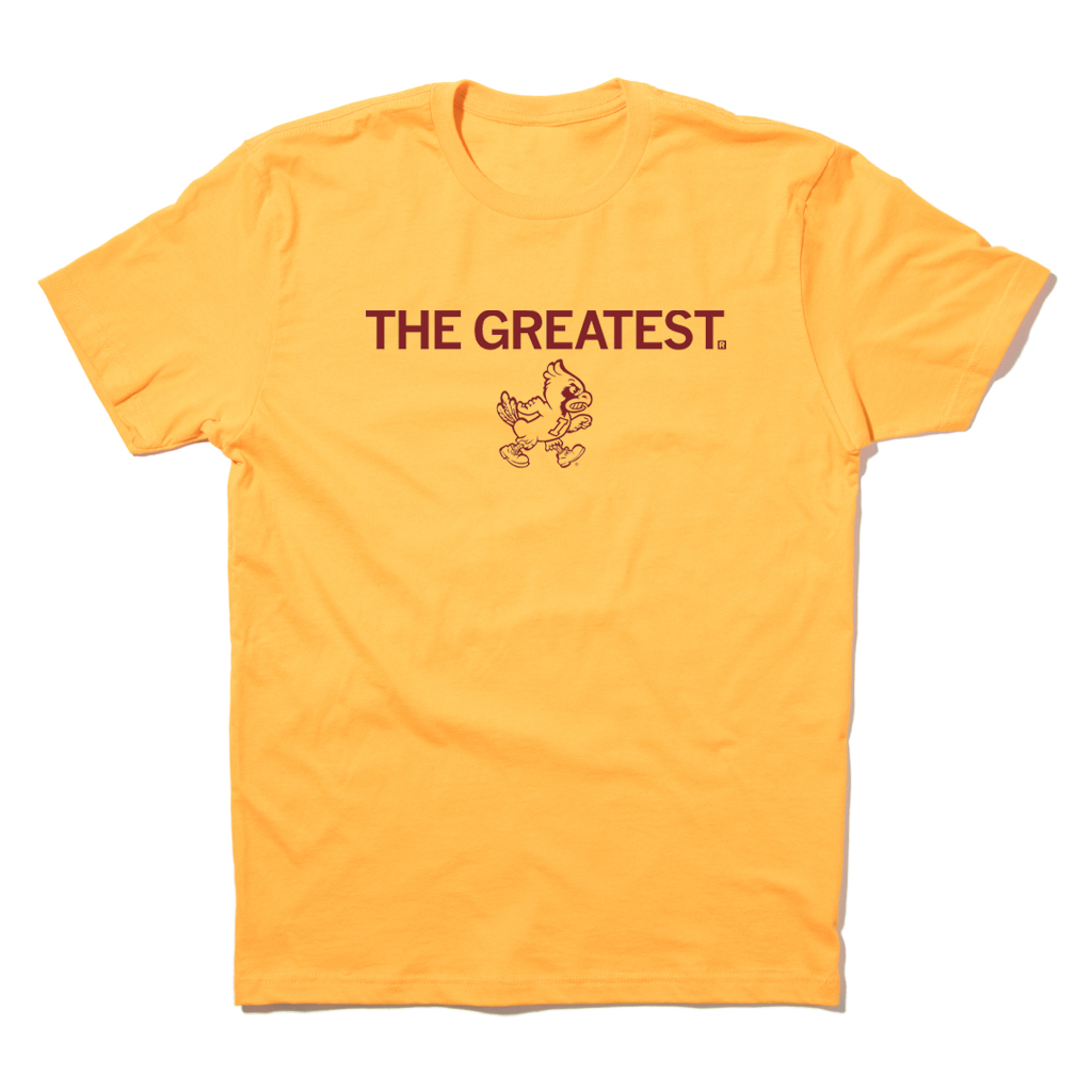 Short-sleeve gold t-shirt with centered cardinal print that says, "THE GREATEST" above a vintage Cy Iowa State logo of Cy angrily walking to the right.