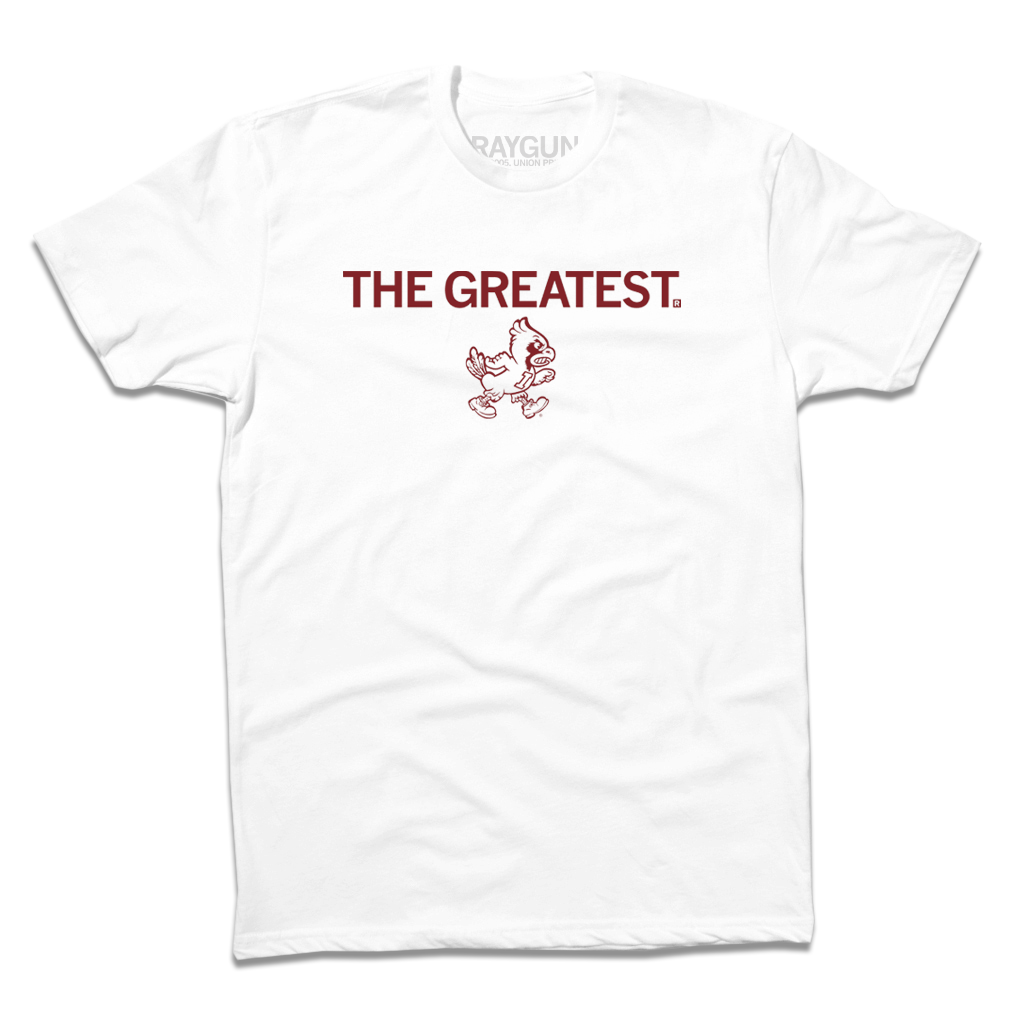 Short-sleeve white t-shirt with cardinal print text that says, "THE GREATEST" above a vintage Cy Iowa State logo of Cy walking to the right.