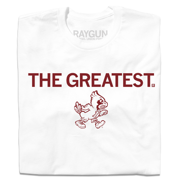 A folded white t-shirt with cardinal print text that says, "THE GREATEST" above a vintage Cy Iowa State logo of Cy walking to the right.