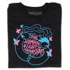 A folded black t-shirt with neon pink and blue print depicting two people holding hands around text that says, "The Human Right To Transform" with some butterflies flying around the sides.