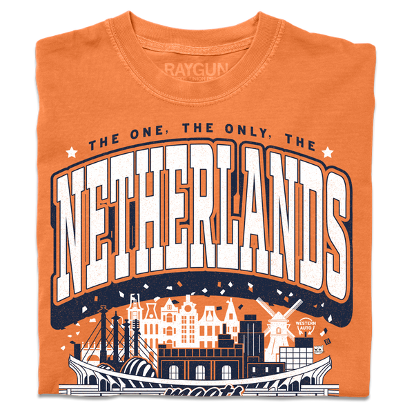 A folded orange heavyweight t-shirt with navy and white ink. Text from the top to the bottom reads 