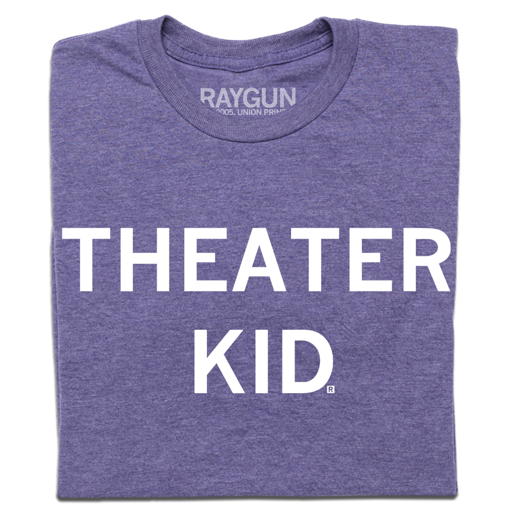 A folded heather purple t-shirt with centered white text that says "Theater Kid"