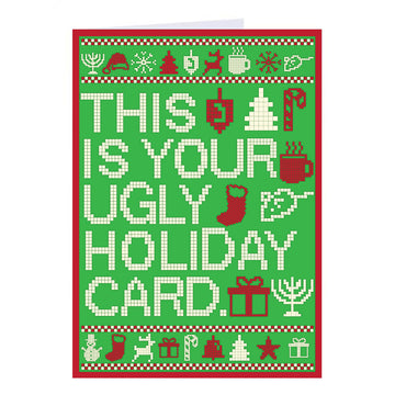 A RAYGUN ugly holiday sweater greeting card with a green pixelated background featuring the text THIS IS YOUR UGLY HOLIDAY CARD surrounded by icons of ornaments, trees, stockings, and gifts.