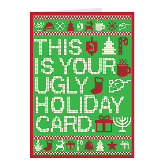 A RAYGUN ugly holiday sweater greeting card with a green pixelated background featuring the text THIS IS YOUR UGLY HOLIDAY CARD surrounded by icons of ornaments, trees, stockings, and gifts.